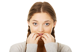 Woman Embarrassed about her Teeth